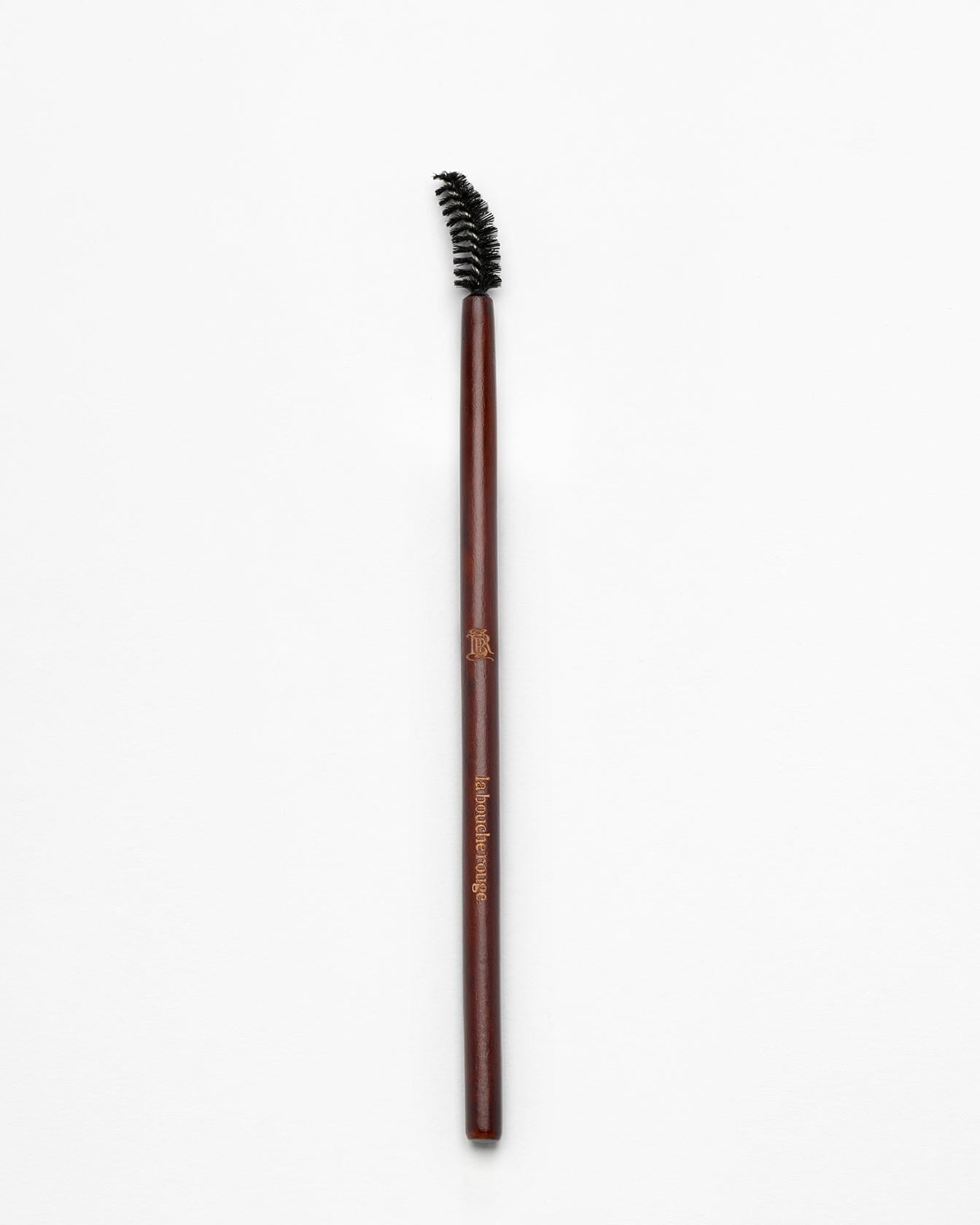 Brosse à sourcils La Bouche Rouge Paris, outil pour peigner et définir les sourcils, image montrant la brosse en détail.