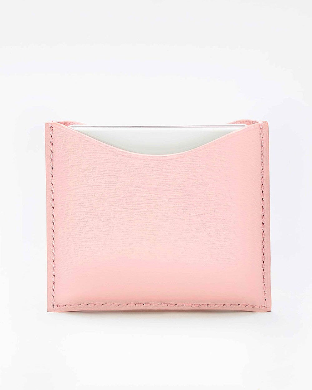 Poudrier en cuir rechargeable La Bouche Rouge Paris, élégant avec miroir intégré, destiné à contenir de la poudre pour le maquillage.
