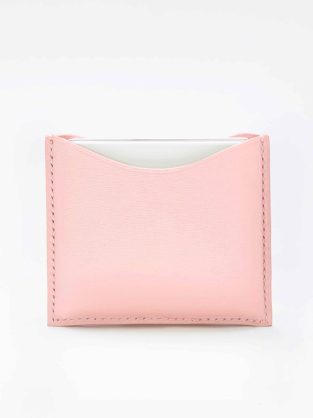 Poudrier en cuir rechargeable La Bouche Rouge Paris, élégant avec miroir intégré, destiné à contenir de la poudre pour le maquillage.