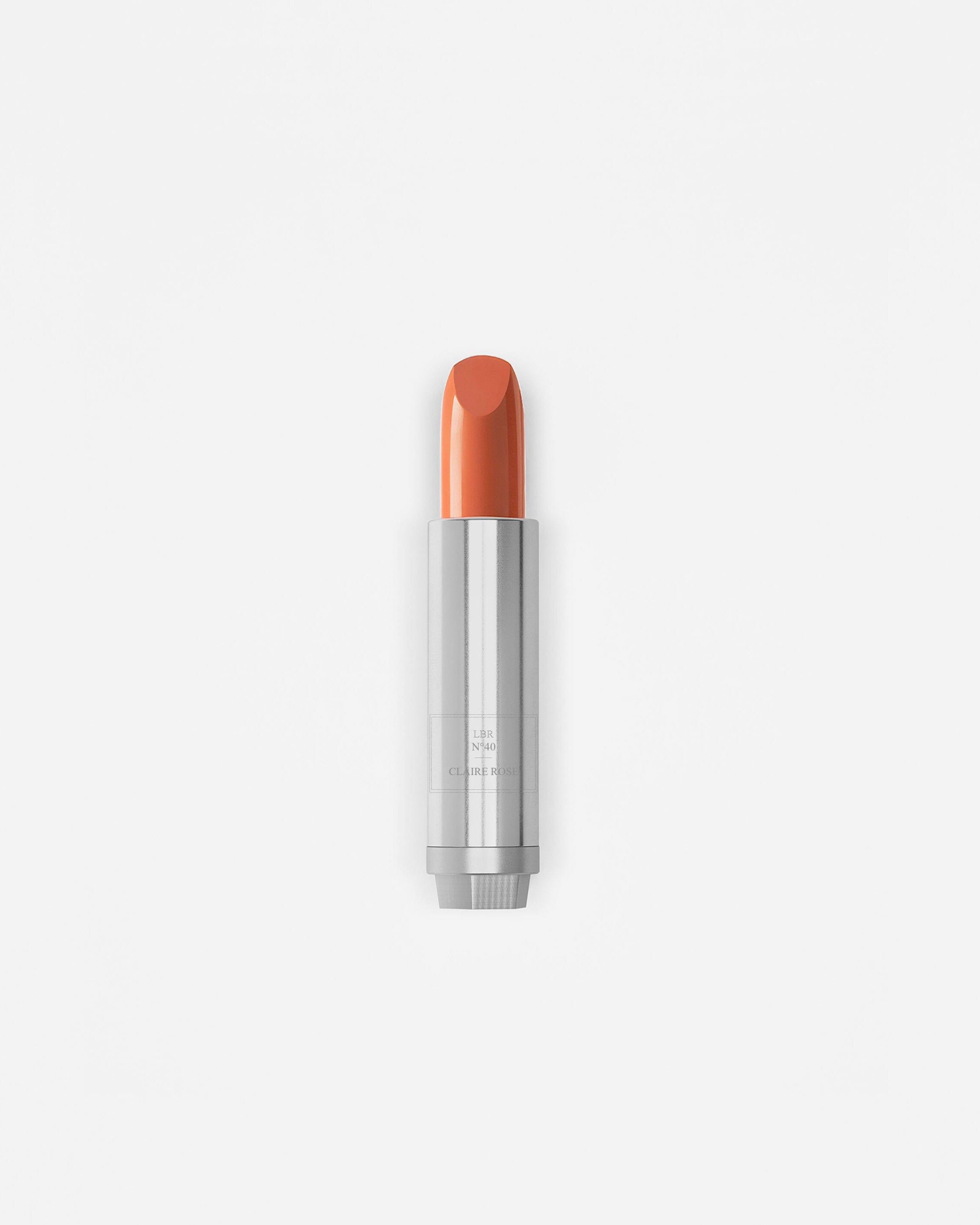 Rouge à lèvres La Bouche Rouge Paris couleur rose clair, texture crémeuse et fini brillant, présenté en tube élégant.
