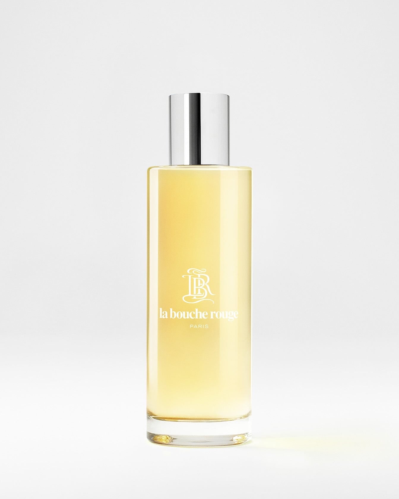 Flacon de parfum Capri Lumière Jaune de La Bouche Rouge Paris, eau de parfum, avec design élégant et jaune vif.