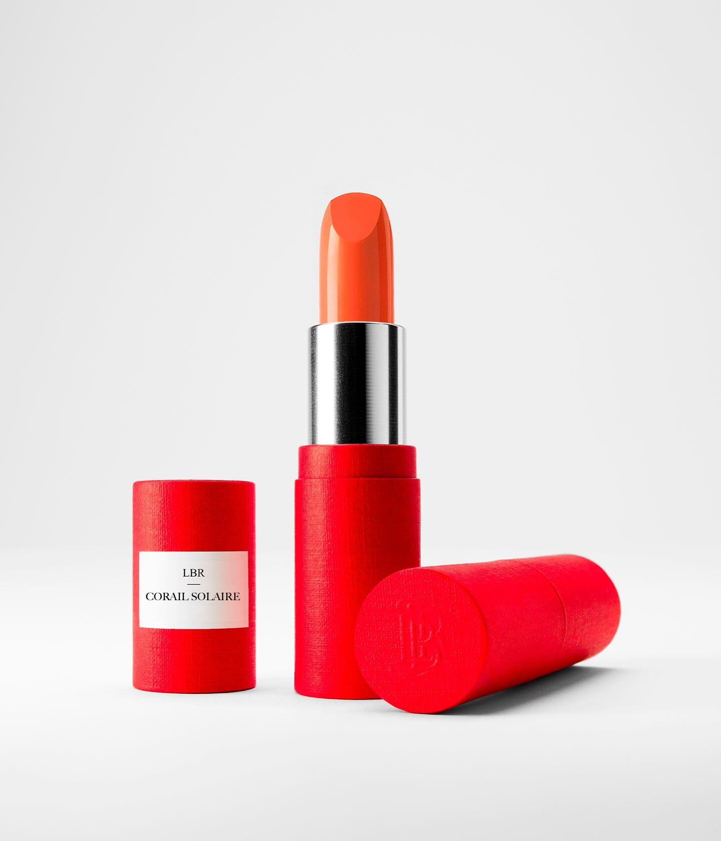 Accord solaire La Bouche Rouge Paris en teinte abricot et corail, refill solaire pour maquillage naturel et lumineux.