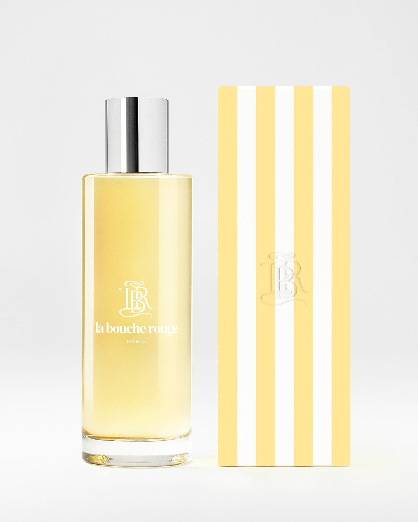 Parfum CAPRI Lumière Jaune de La Bouche Rouge Paris avec flacon élégant et étiquette jaune lumineux.