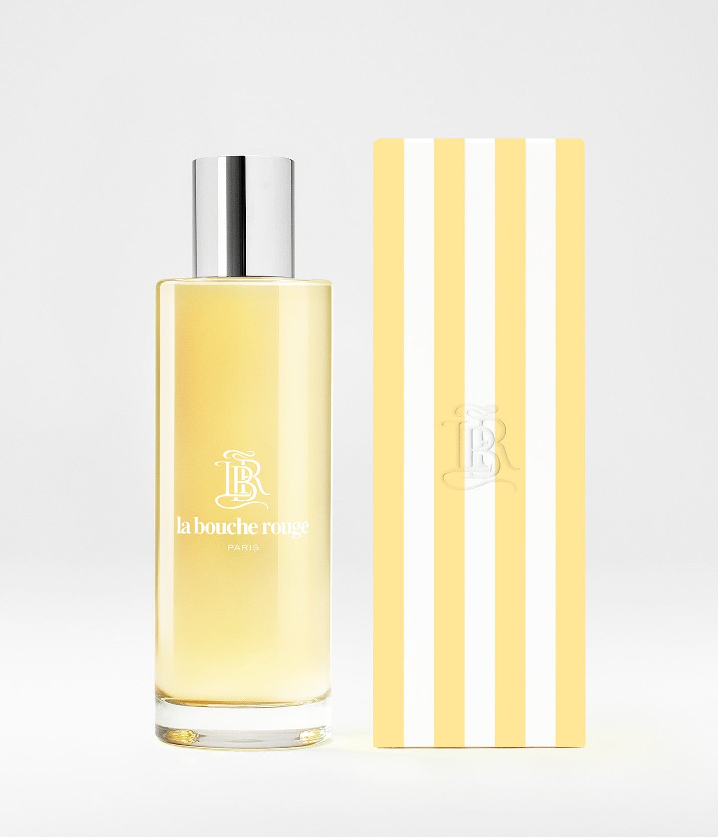Parfum CAPRI Lumière Jaune de La Bouche Rouge Paris avec flacon élégant et étiquette jaune lumineux.