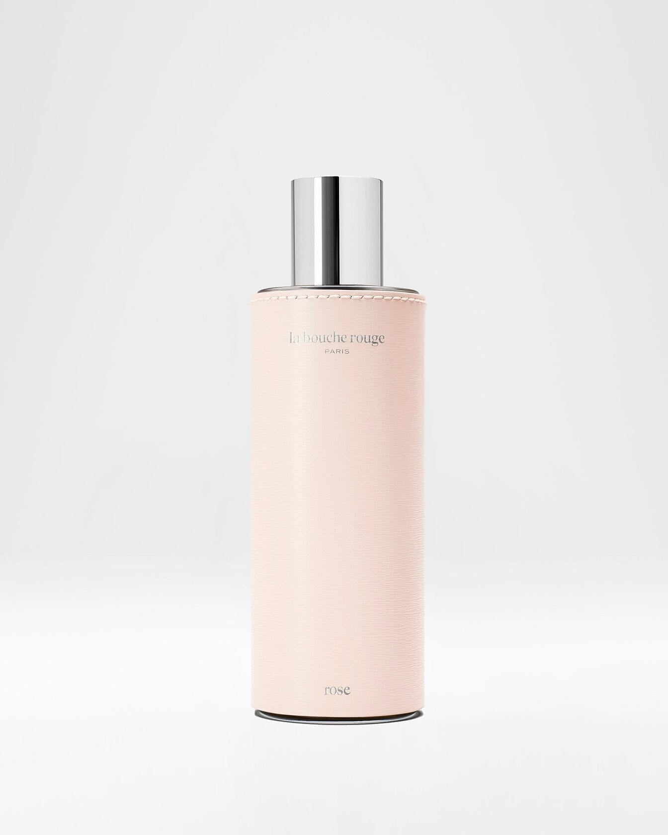 Flacon d'extrait de parfum Rose La Bouche Rouge Paris 100ml, avec design élégant et étiquette rose, vue de face.