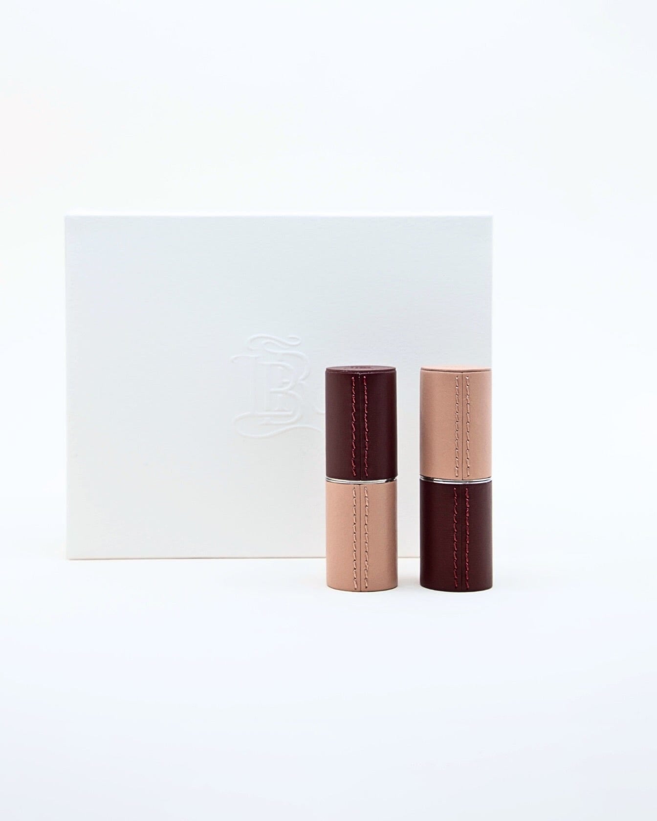 Écrin rechargeable La Bouche Rouge Paris Duo CHOC édition limitée, finition élégante en cuir noir et or.