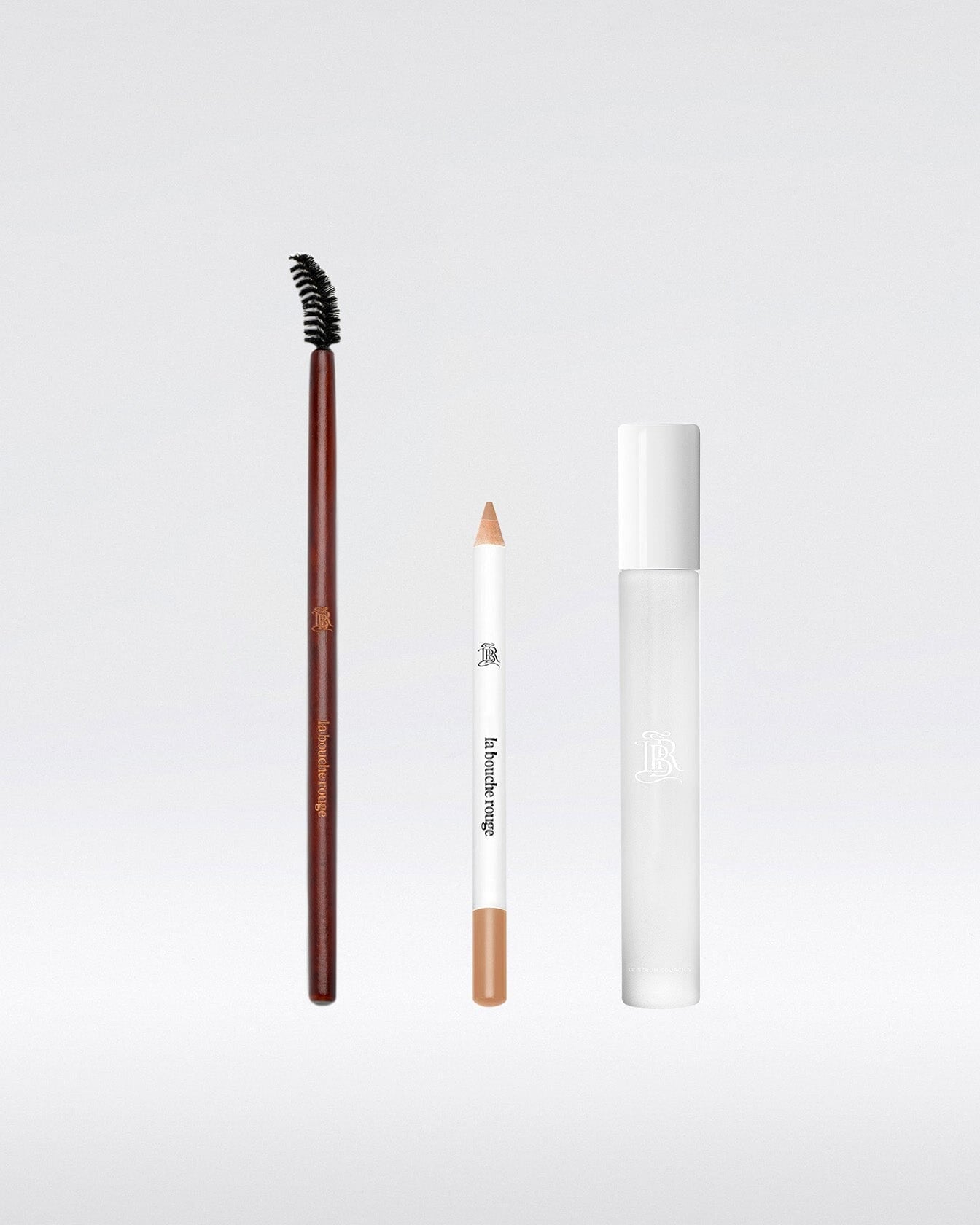 Coffret maquillage pour sourcils La Bouche Rouge Paris avec pinceau et produits pour sourcils blonds, élégant et pratique.