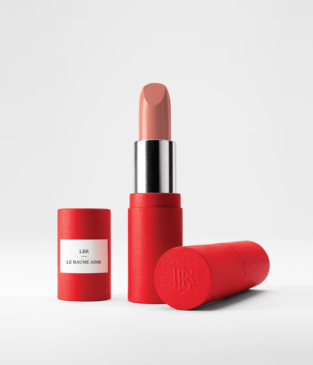 Baume à lèvres La Bouche Rouge Paris, soin des lèvres hydratant avec tube élégant, image montrant le produit ouvert et fermé.