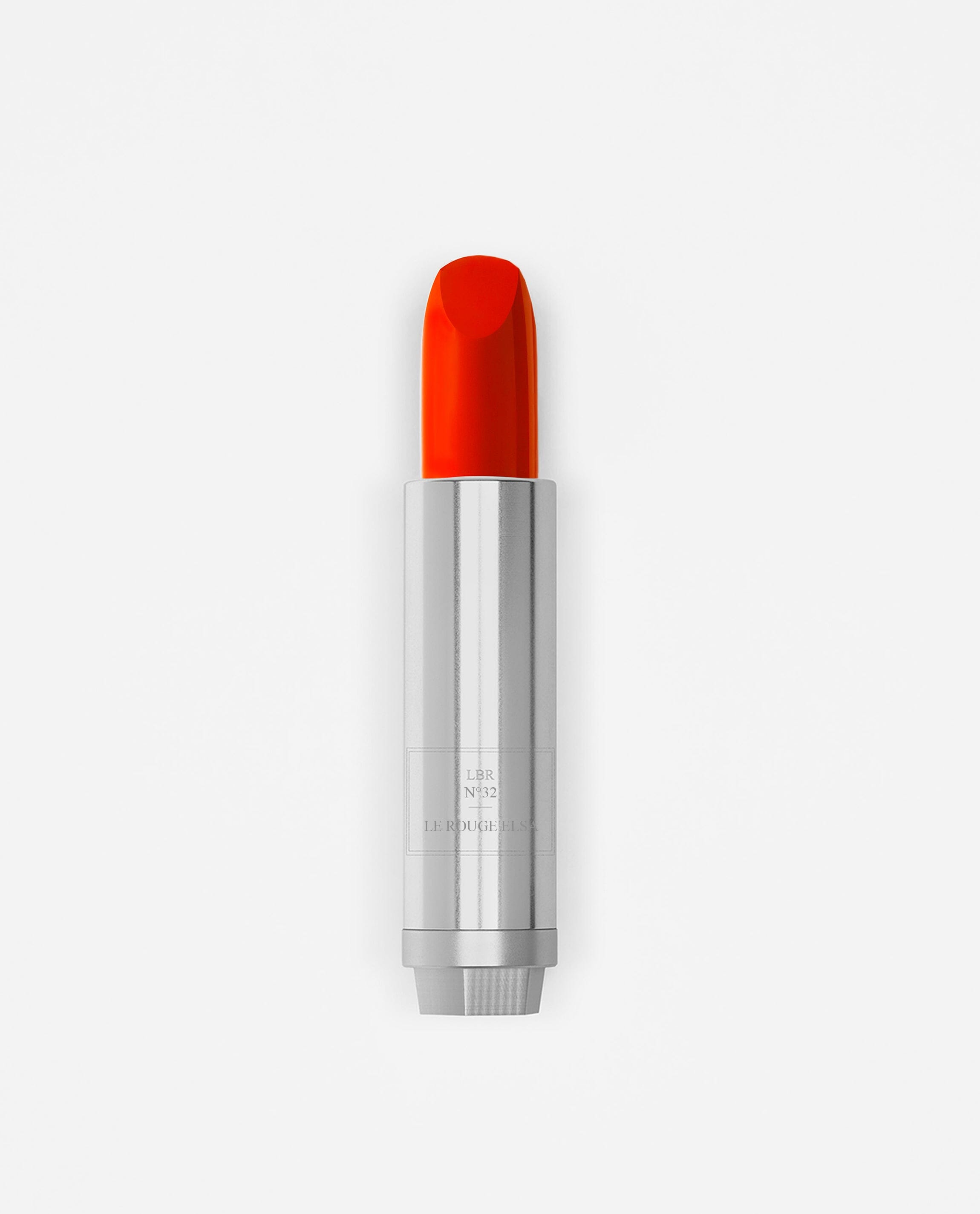 Rouge à lèvres La Bouche Rouge Paris couleur rouge éclatant, élégant tube métallique, fermé, sur fond neutre.