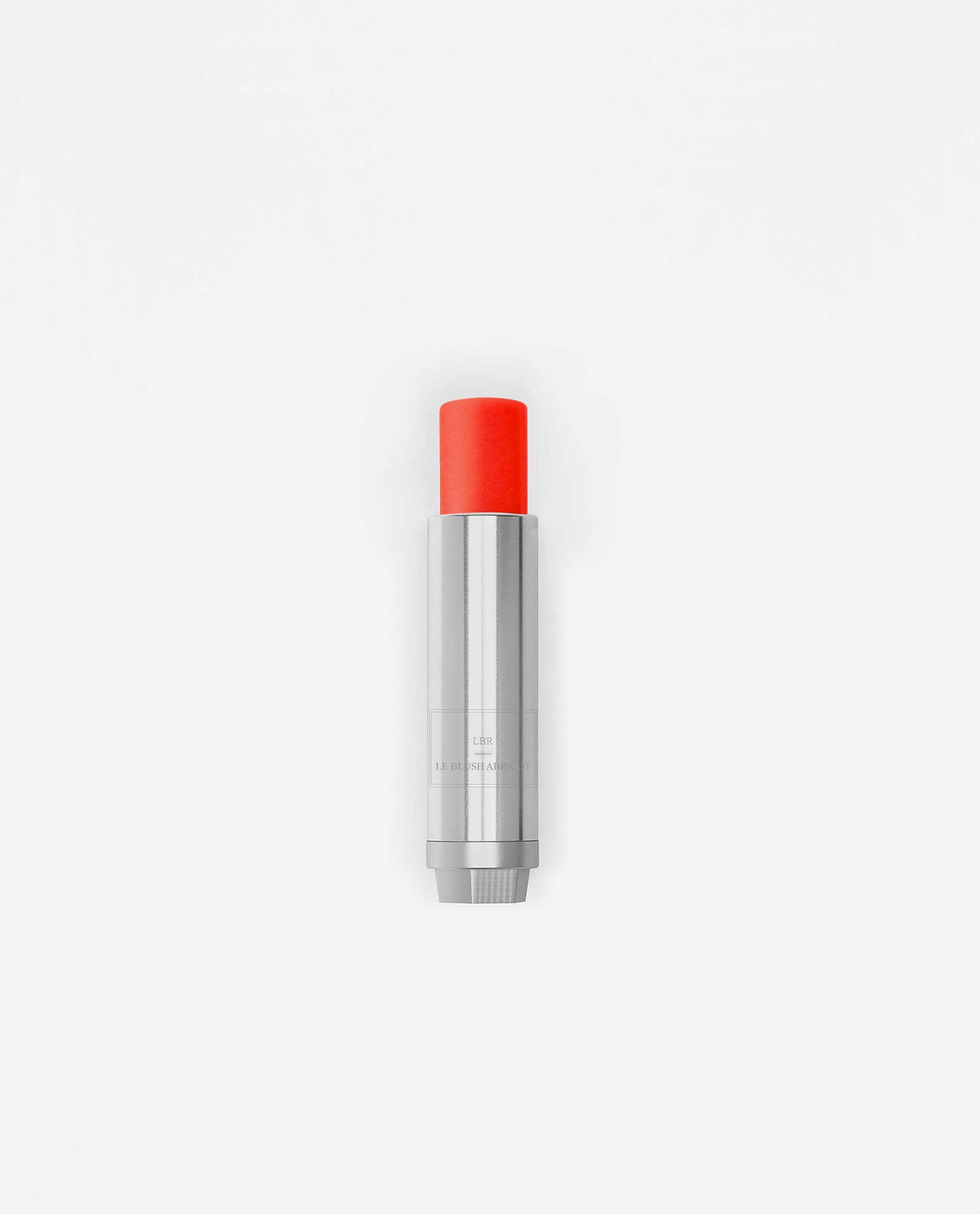 Accord solaire La Bouche Rouge Paris avec abricot et corail, maquillage solaire pour un teint lumineux et naturel.