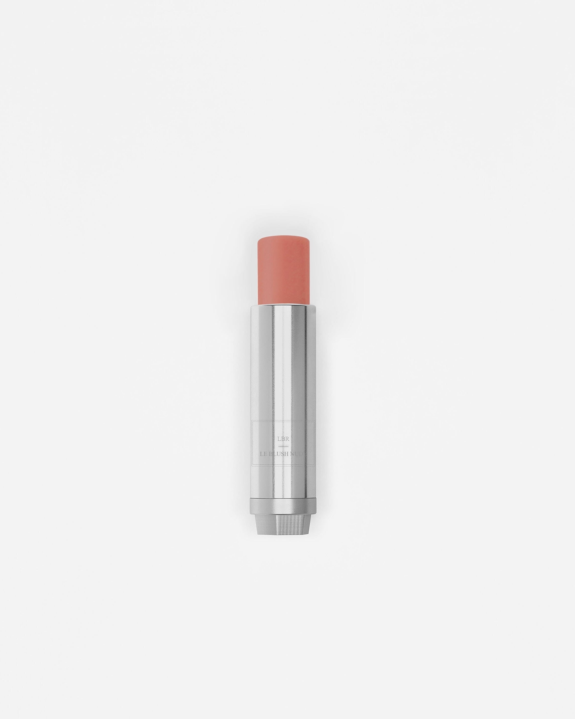 Blush en stick La Bouche Rouge Paris dans la teinte nude, présentation compacte avec application facile.