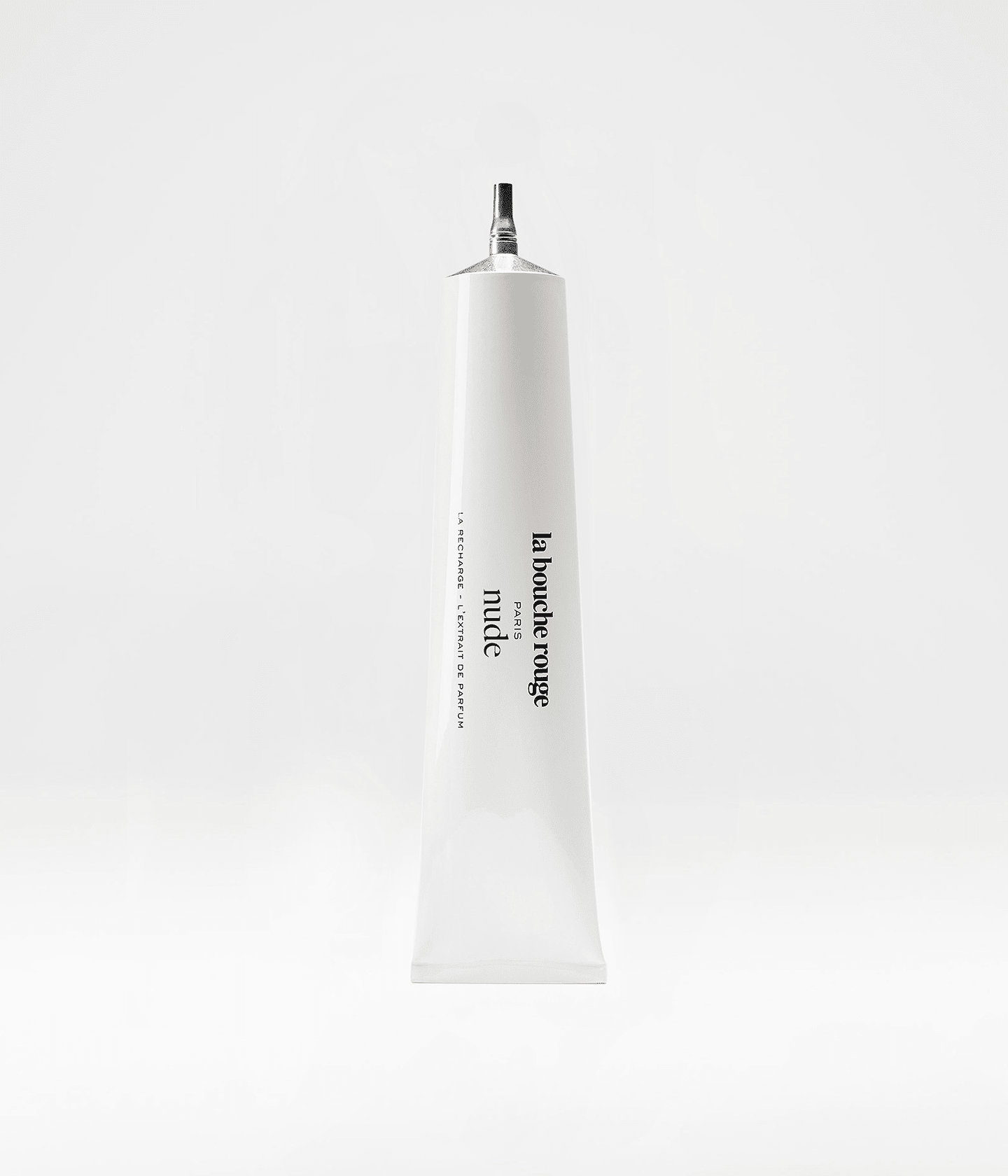 Recharge de parfum Nude de 100 ml de La Bouche Rouge Paris, contenant le flacon en verre transparent avec bouchon noir.
