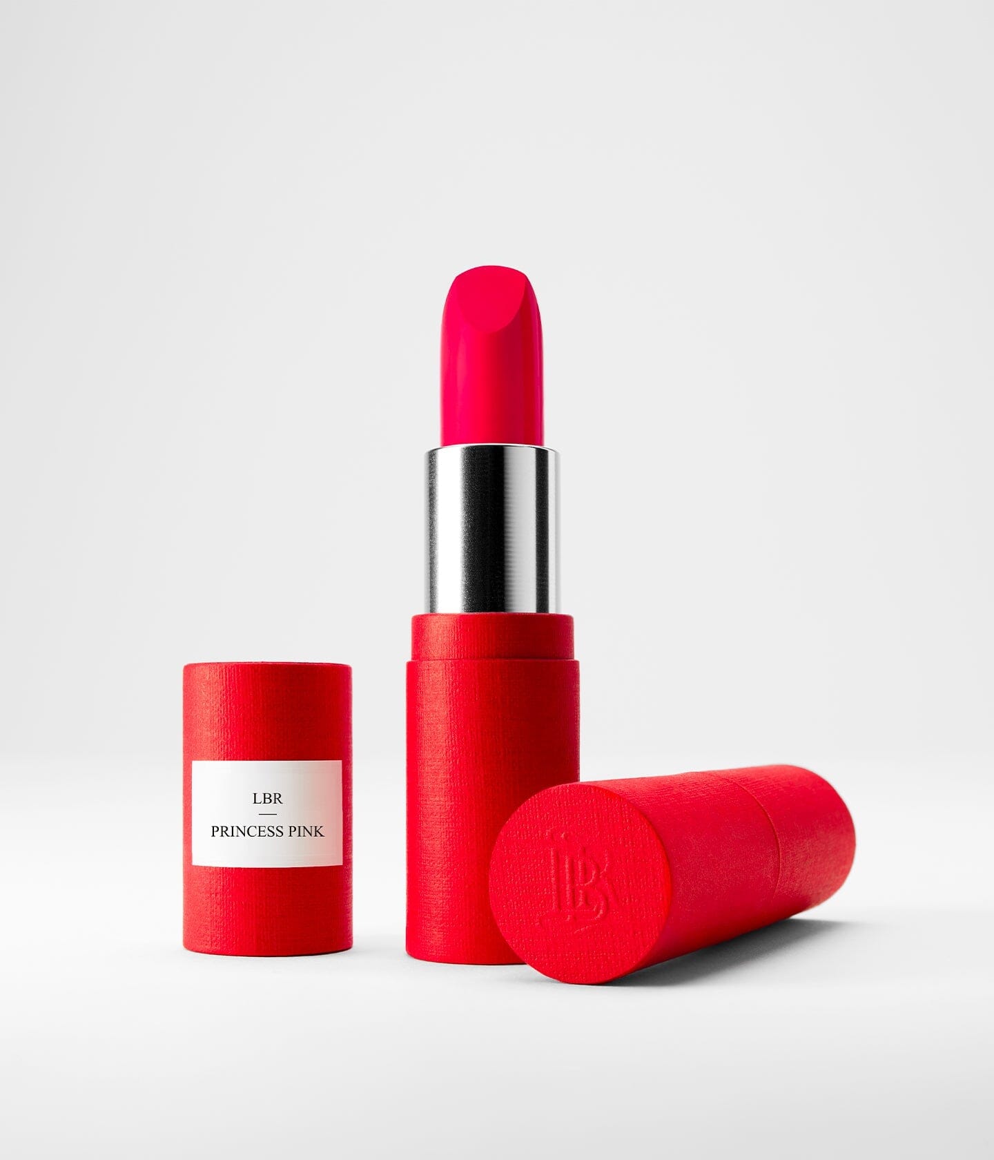 Rouge à lèvres Princess Pink de La Bouche Rouge Paris, couleur rose vif dans son emballage rechargeable.