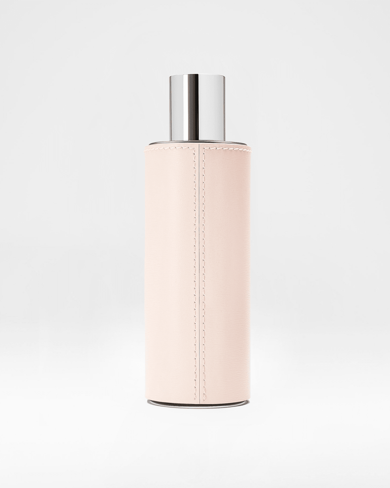 Extrait de parfum Rose de La Bouche Rouge Paris, flacon de 100ml avec une élégante étiquette rose.