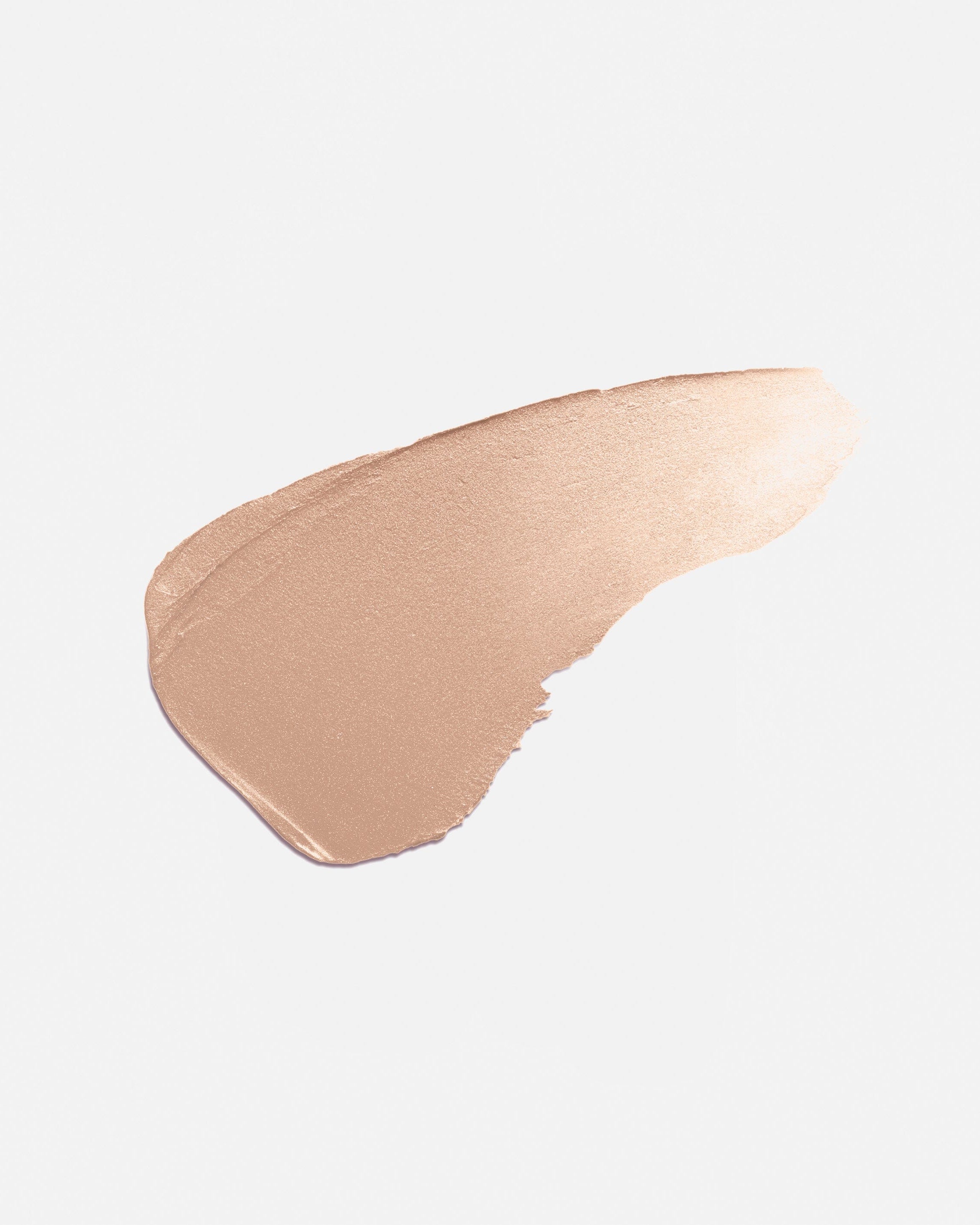 Enlumineur en stick La Bouche Rouge Paris avec texture dorée pour un éclat lumineux sur la peau.