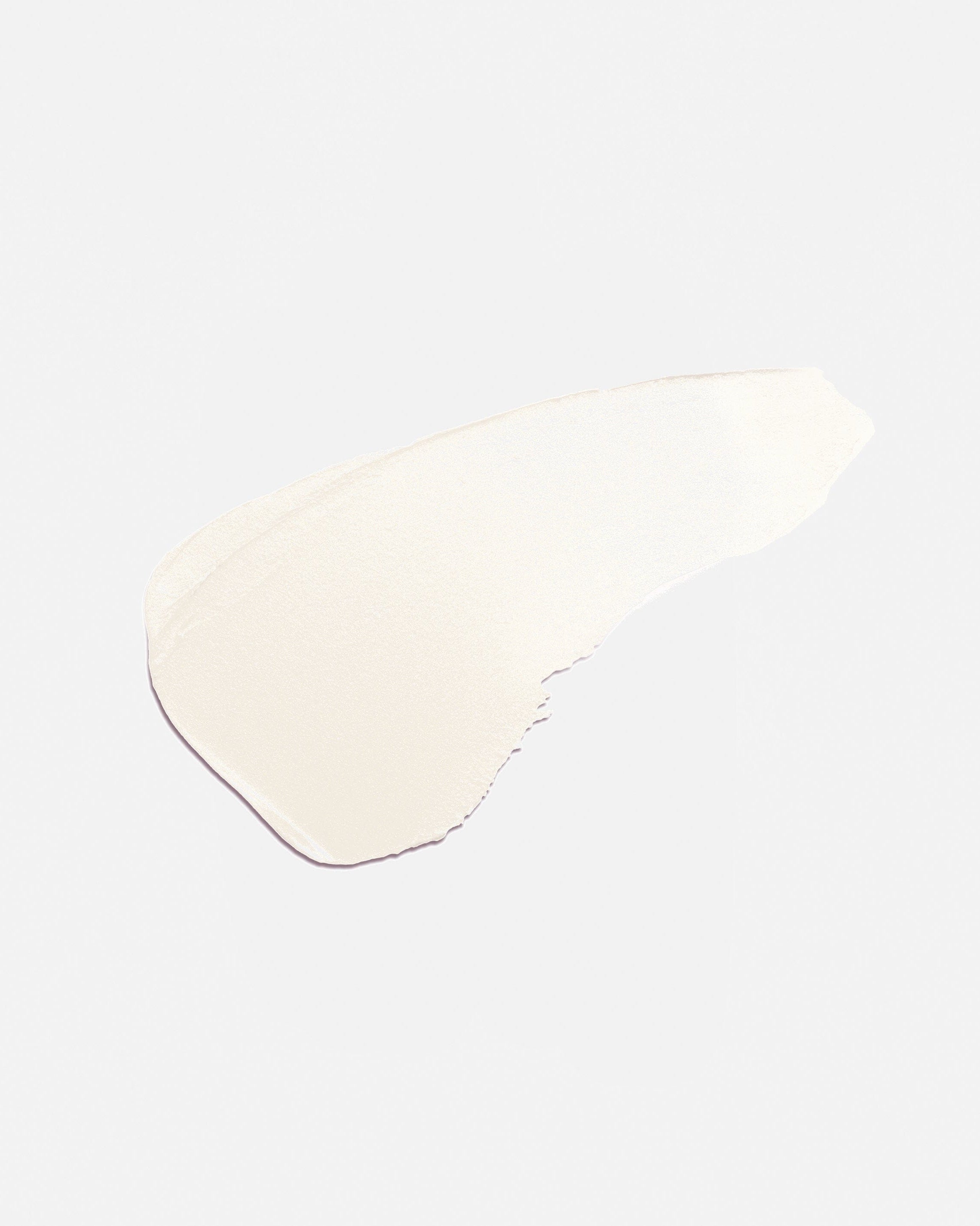 Stick enlumineur La Bouche Rouge Paris avec texture lumineuse blanche pour un éclat naturel et sophistiqué.