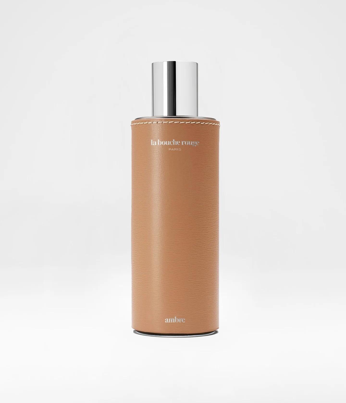 Extrait de parfum Ambre La Bouche Rouge Paris 100ml, flacon fermé, mettant en valeur le parfum chaud et oriental.