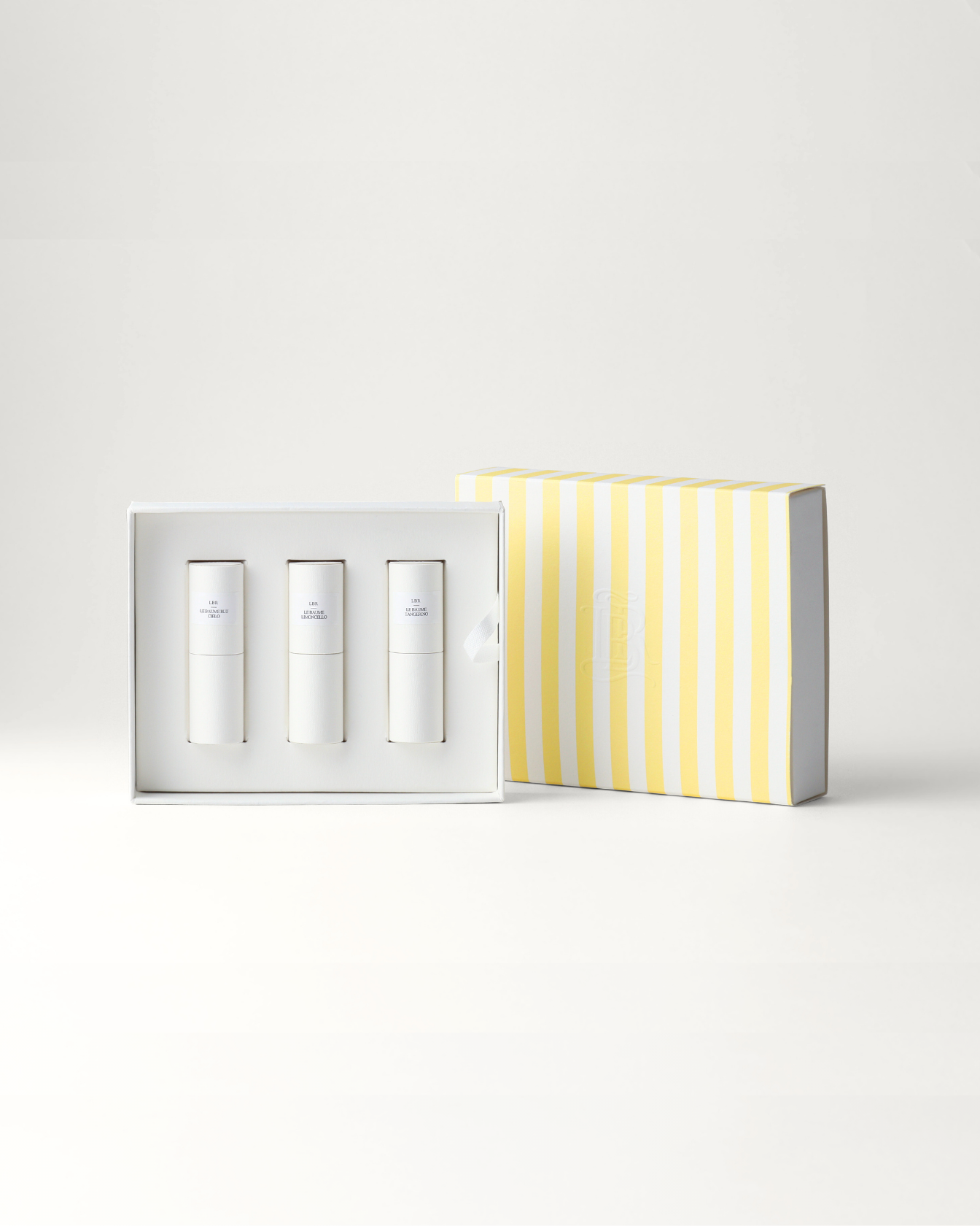 Coffret Dolce Vita La Bouche Rouge composé de trois baumes teintés transparents : Blu Cielo, Limoncello et Tangerino, éditions limitées été 2025