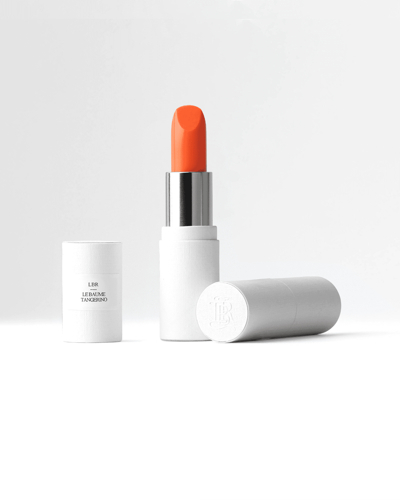 Coffret maquillage La Bouche Rouge Paris Dolce Vita Tangerino avec plusieurs produits colorés et élégants à l'intérieur.
