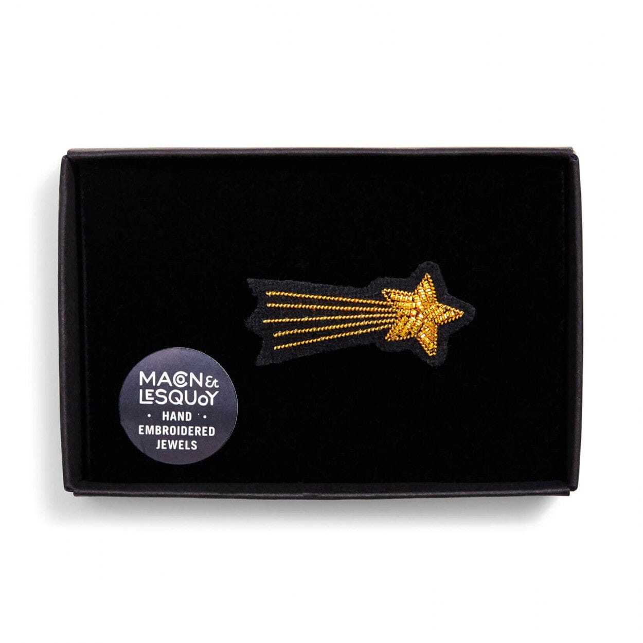 Broche étoile filante La Bouche Rouge Paris, ornement en métal avec finition brillante, élégante et sophistiquée.